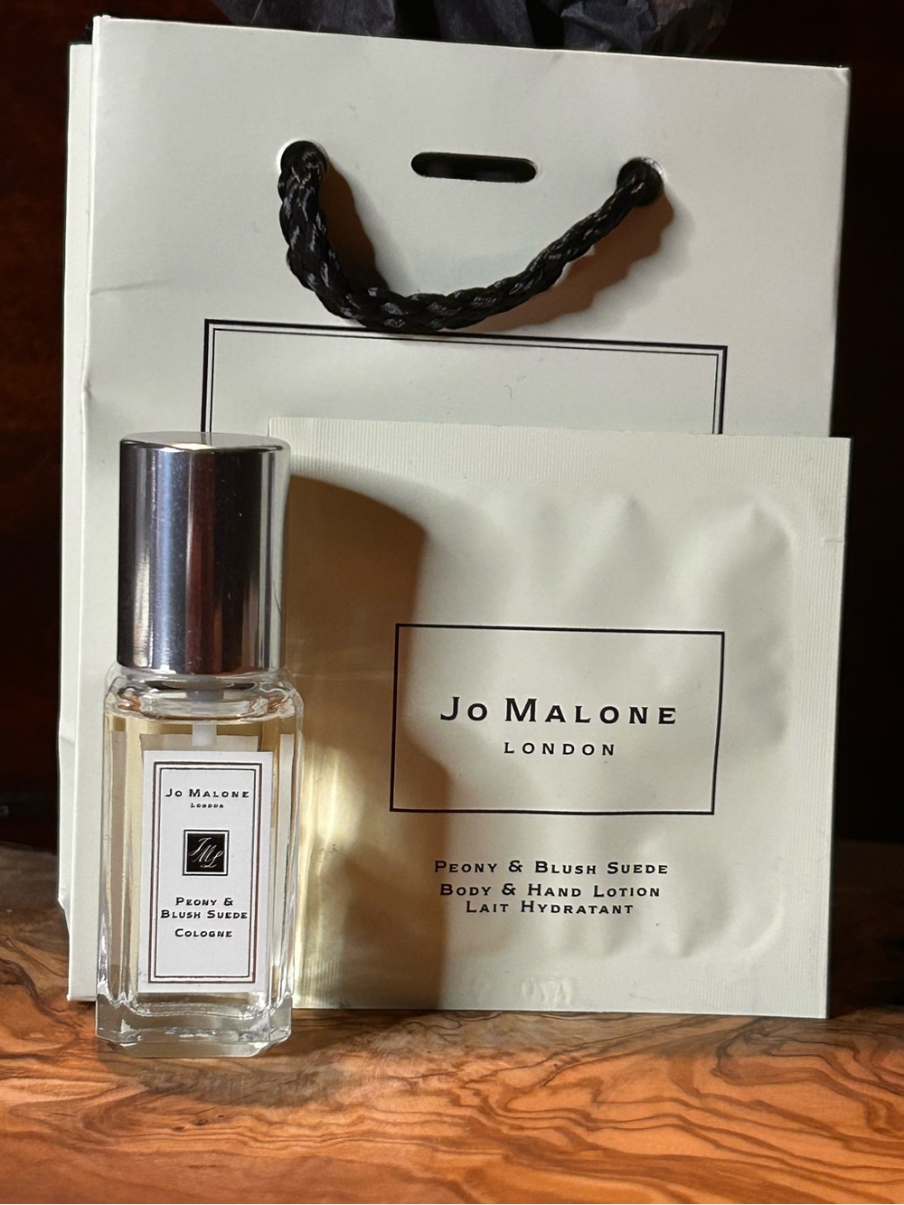 New Peony & Blush Suede Cologne (9 ml) w/ Body & Hand Lotion Sachet Combo.